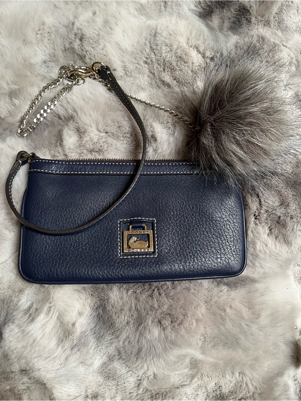 Dooney & Bourke Navy Pebbled Leather Wristlet with Fur Pom